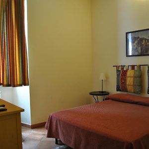Kamer met een Queen Size Bed